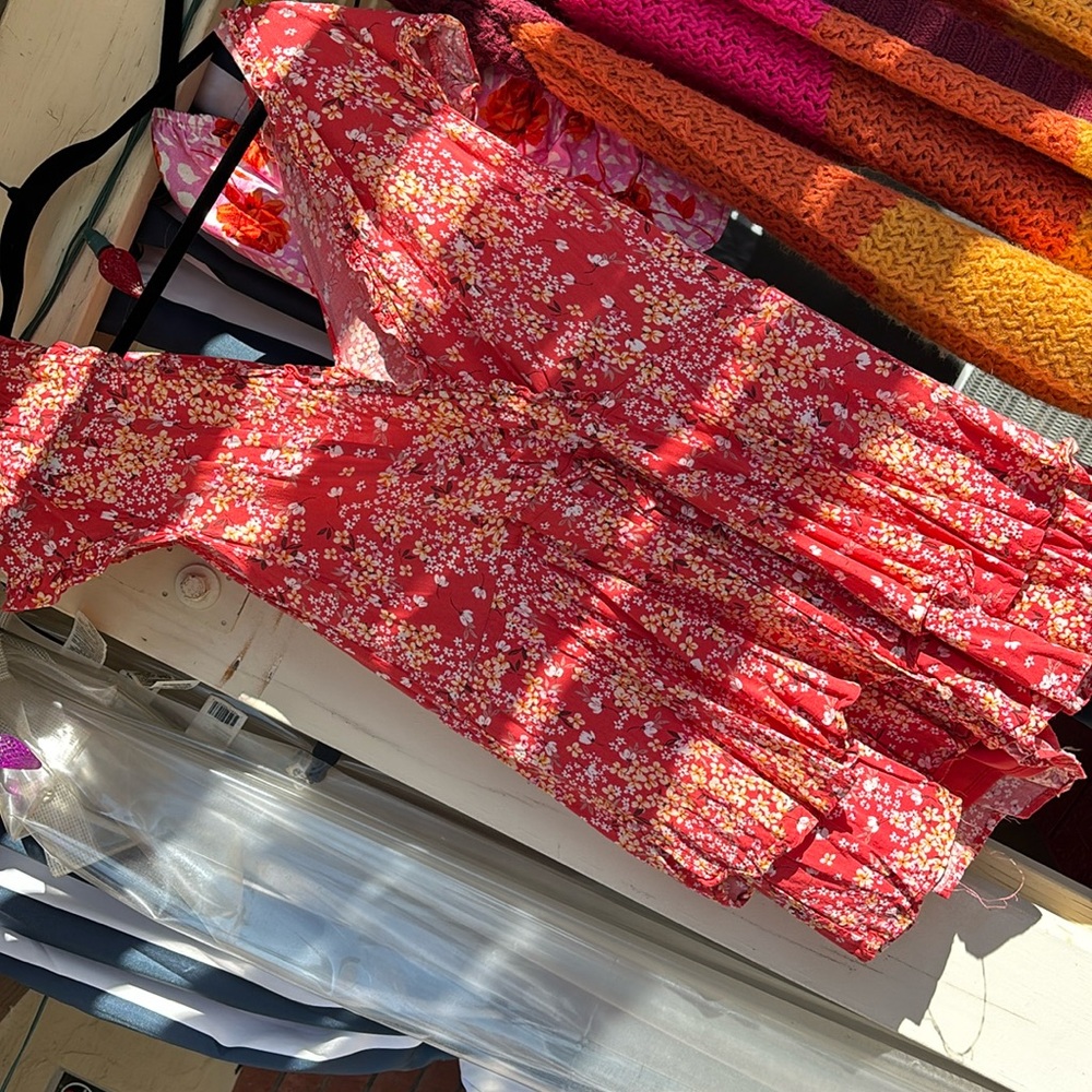 Mi Ami romper, orange, red with yellow and white and pink flowers